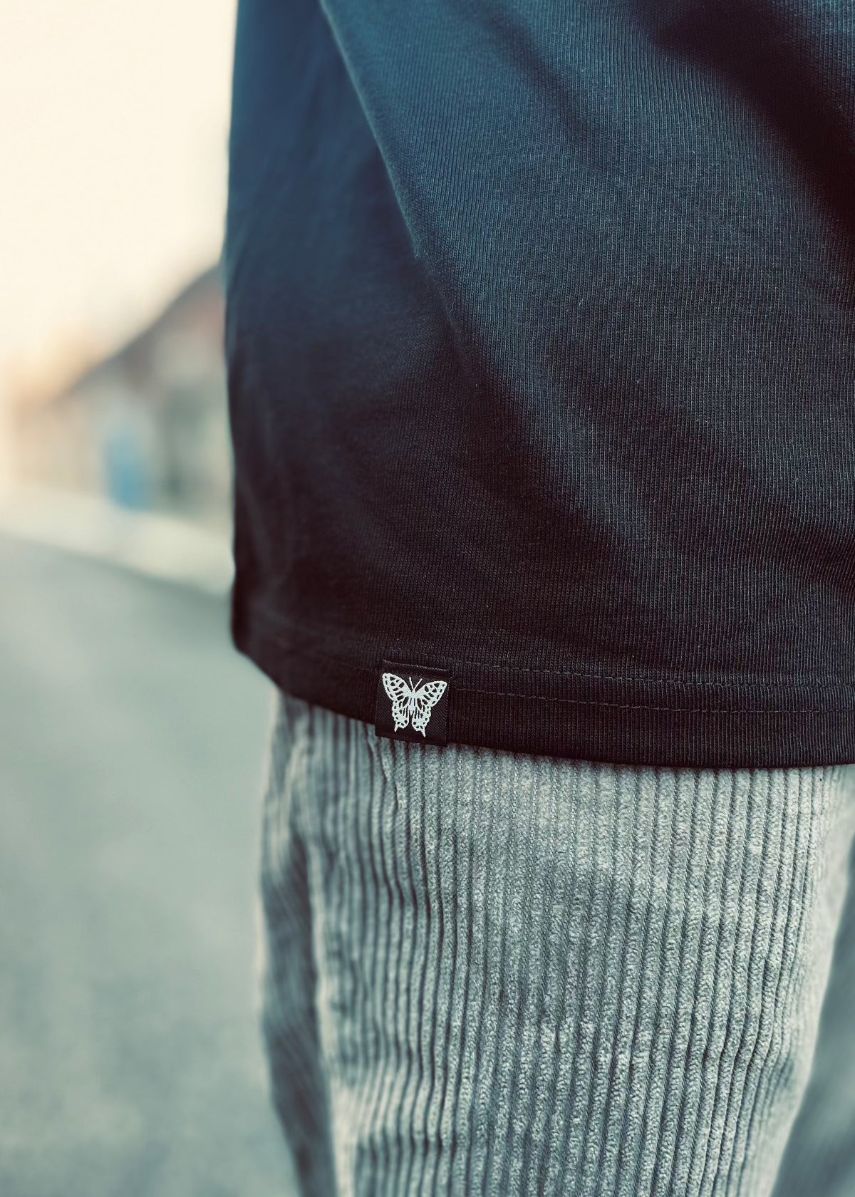 Black oversized T-shirt with CAT HEAD back print, KATERMUKKE chest logo, and PAPAGE label detail.